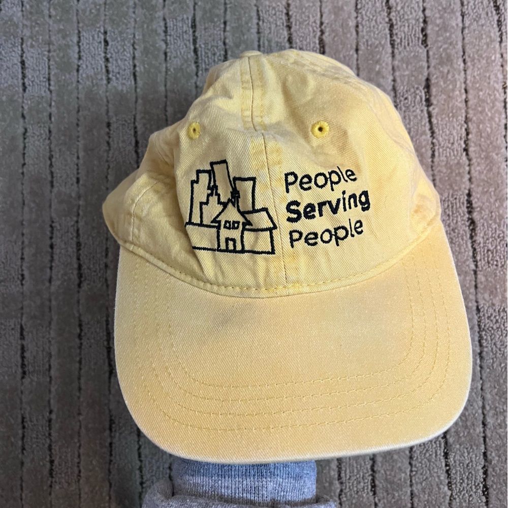 Yellow Baseball Cap with Embroidered People Serving People
